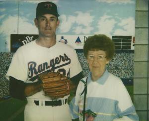 Mom posing by Nolan Ryan cutout.